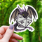 Mimic Co: Angry Black Dragon Hatching From D20 Sticker - 3"
