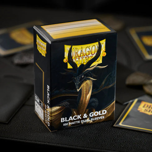 Dragon Shield: 100 Standard Size Dual Matte Sleeves - Black & gold