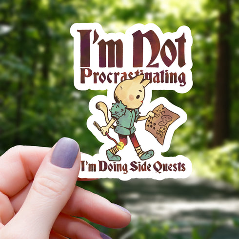 MGCo: Cat Doing Side Quests Funny Sticker - 3"